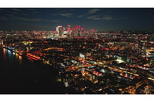 Canary Wharf illuminating London's, an Architecture Photo by Goinyk