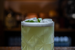 Basil cocktail on wooden bar, a Photo by Grafvision photography