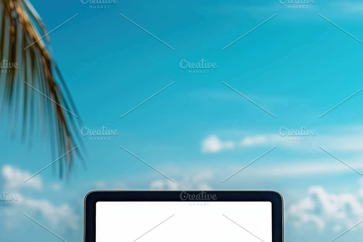 A tablet iPad mockup with a blank screen placed on a sandy beach, next to a ref, an iPad Mockup by Textures & Backgrounds