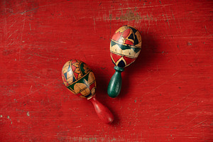 Couple of maracas on vintage red background top view, an Arts & Entertainment Photo by Natalia Klenova's Shop