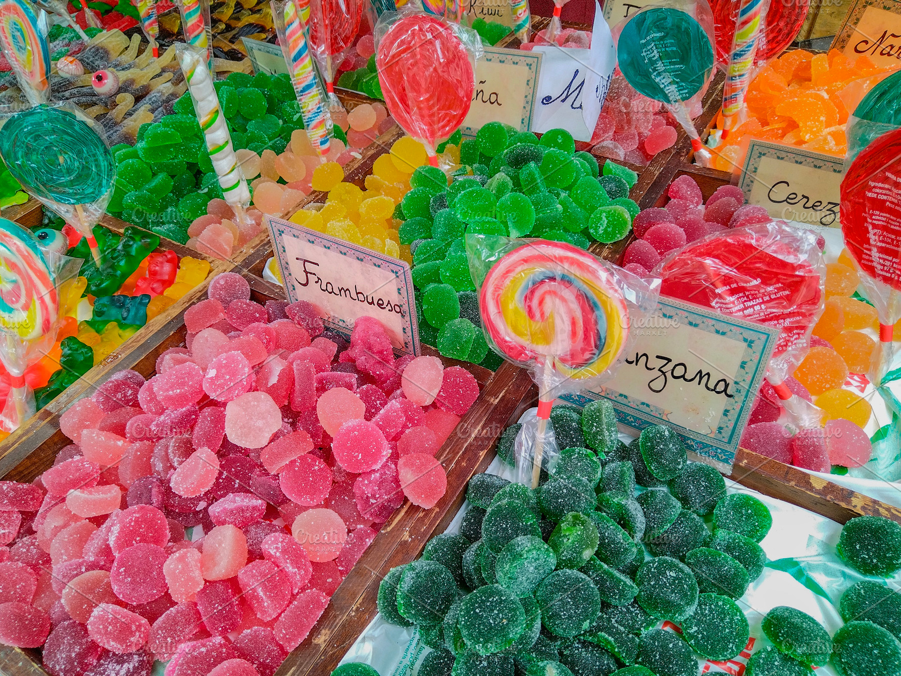 Colorful jelly candies at outdoor sweet market, a Food & Drink Photo by DanFLCreativo