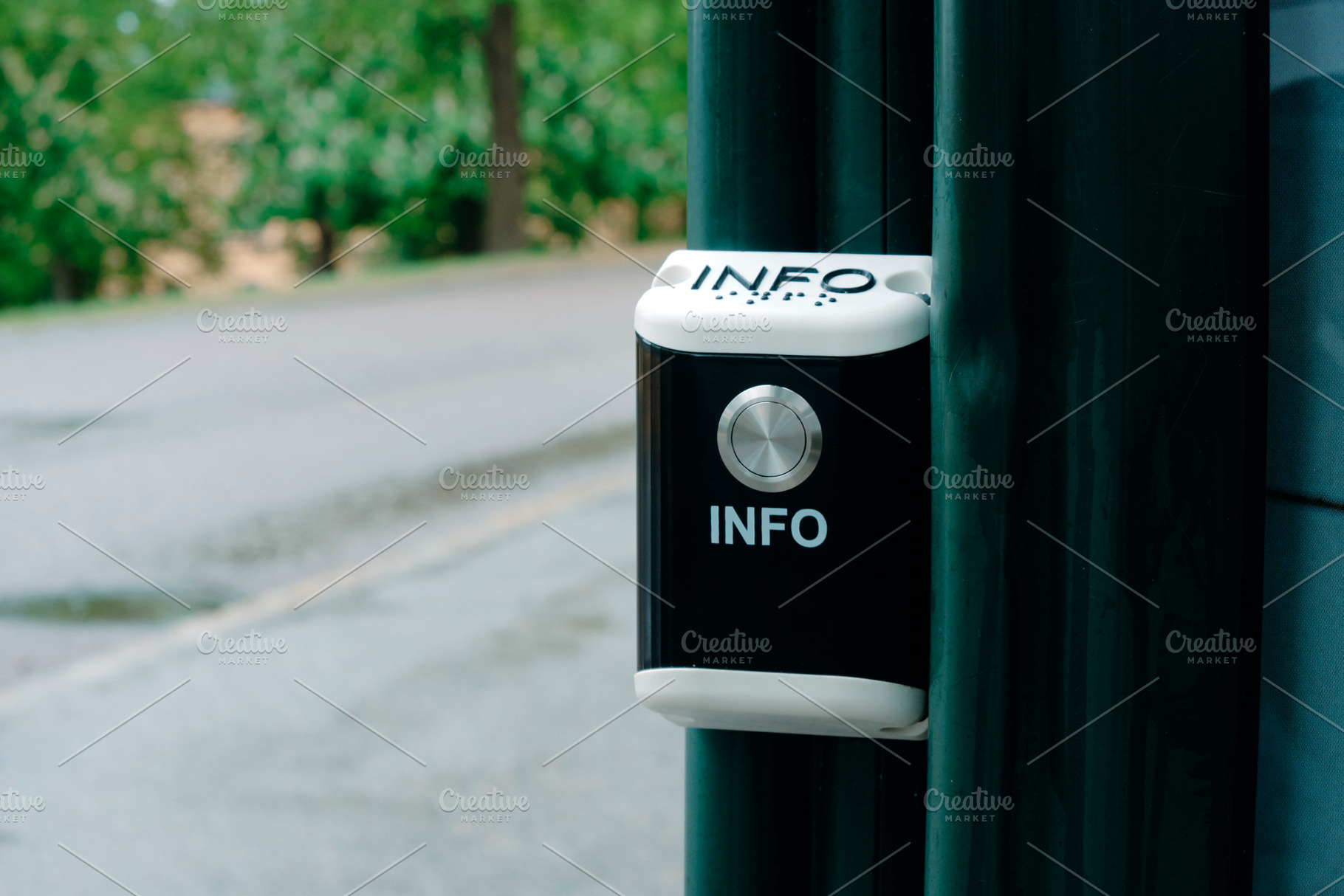 public information button beside an outdoor path, a Photo by Nito