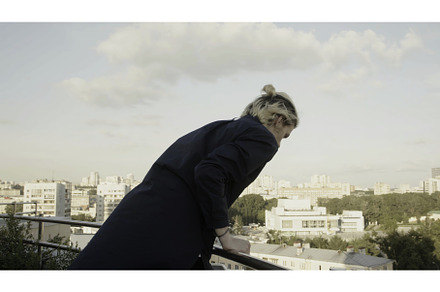 A man in a panic quickly climbs onto, a Person Photo by Media Whale Stock