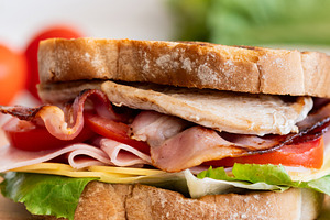 Close Up of Club Sandwich with Bacon, Ham, Cheese and Grilled Chicken, a Food & Drink Photo by etorres69