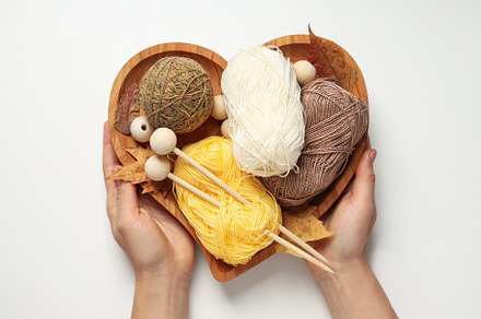 Concept of cozy and relax hobby, knitting, top view, a Beauty & Fashion Photo by AtlasStudio