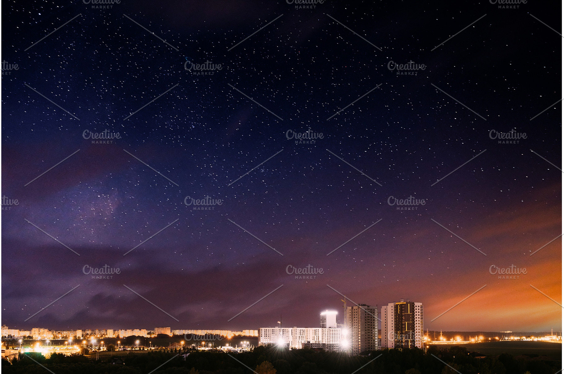 City lights against dramatic night, an Architecture Photo by Our Amazing World