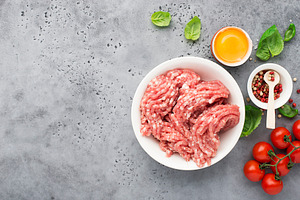 Fresh minced pork with egg salt featuring background, basil, and beef