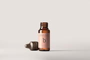 Amber Glass Dropper Bottle Mockups, a Cups & Container Mockup by pmvch (Thumbnail 10 of 20)