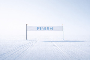 Finish line banner on snowy field, p, a Photo by Dvoevnore photos