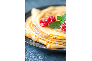 Delicious stack of crepes with fresh, a Food & Drink Photo by Lermont51