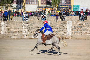 Unidentified polo players at the match, a Photo by saiko3p