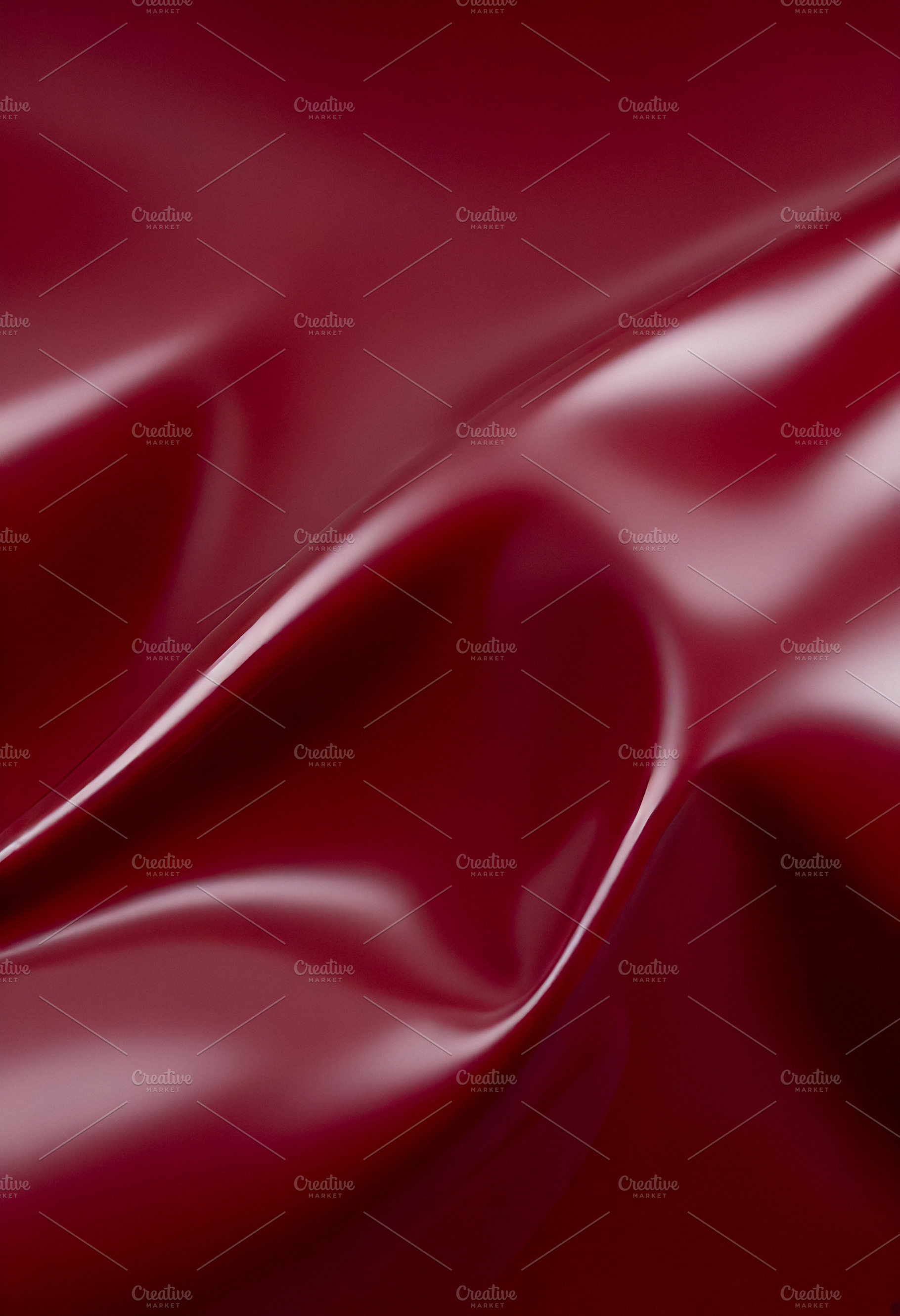 A close-up of deep red glossy leather fabric with soft, flowing folds illuminat, a Background Photo by Kzara Visual Concepts