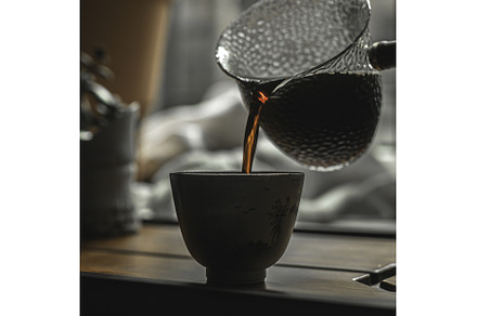 Pouring steaming coffee into a, a Food & Drink Photo by Media Whale Stock