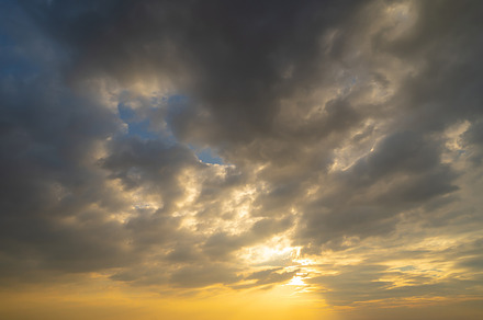Sunset sky. Abstract nature background. Dramatic blue with orang, a Background Photo by Tampatra