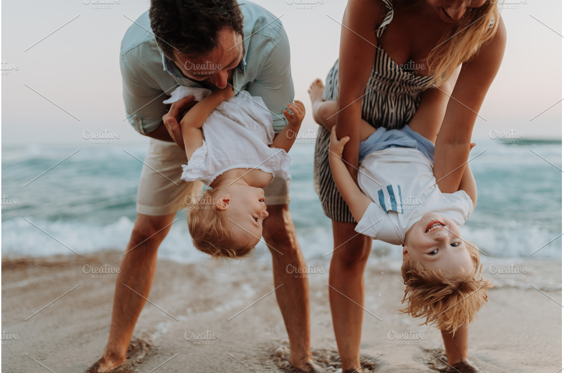A young family with two toddler, a Person Photo by HalfPoint