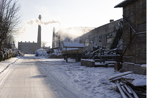 Snow-covered industrial factory