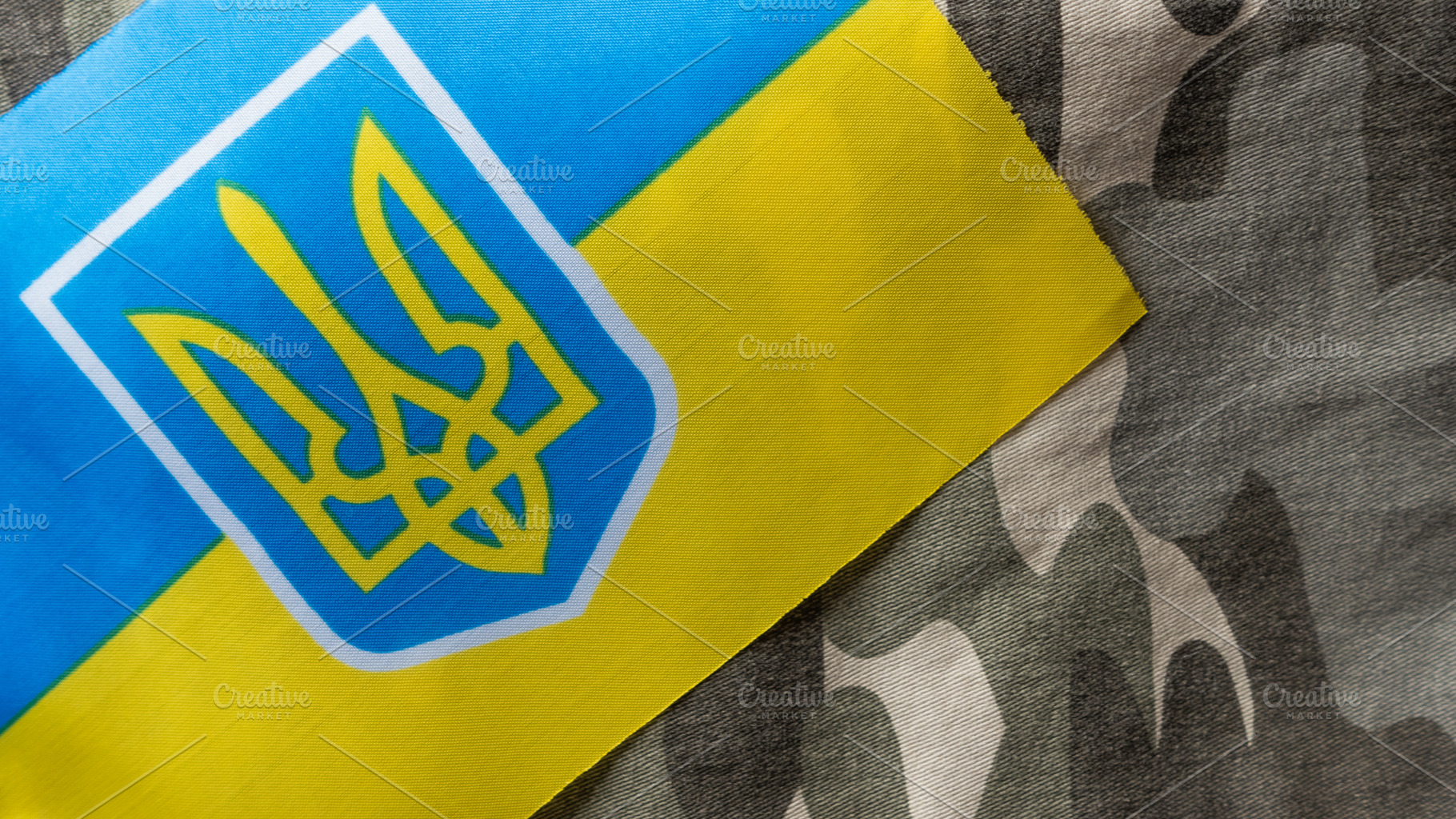 Ukrainian flag on military uniform, a Background Photo by OleksandrRybitskyi