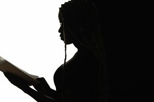 Student silhouette knowledge woman reading book, a Person Photo by Photo Drive Studio