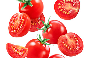 Cherry tomatoes and tomato slices, a Food & Drink Photo by Volff