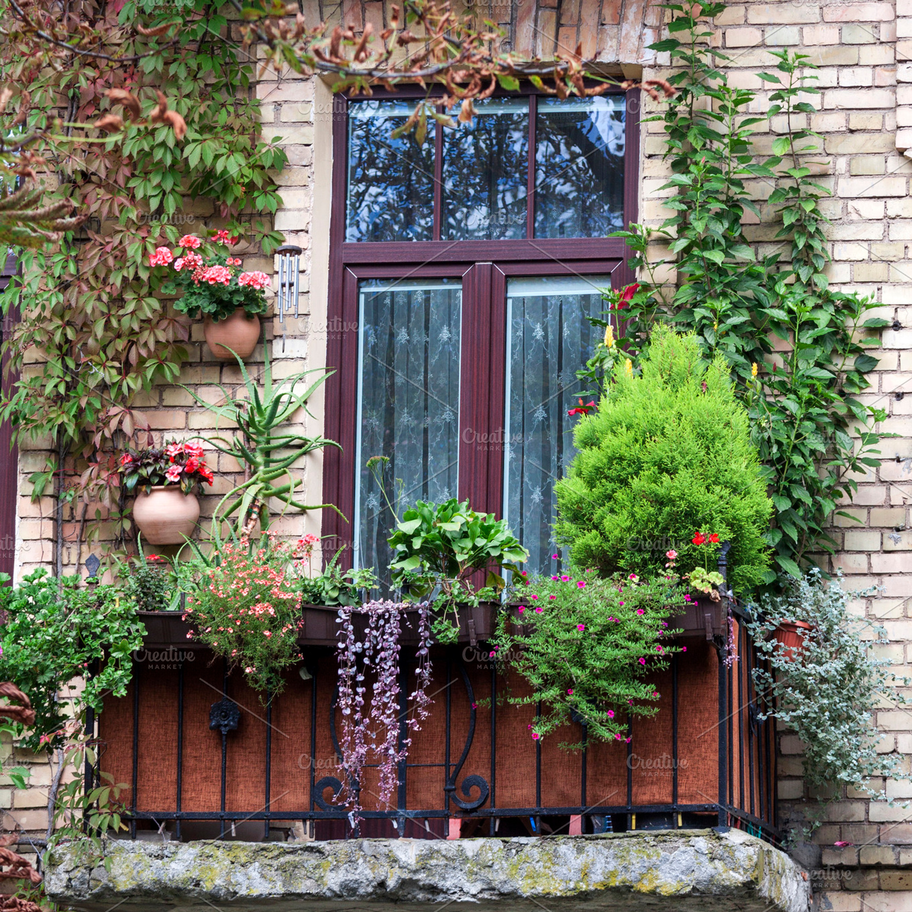 Old balcony with flowers, an Architecture Photo by BOOCYS