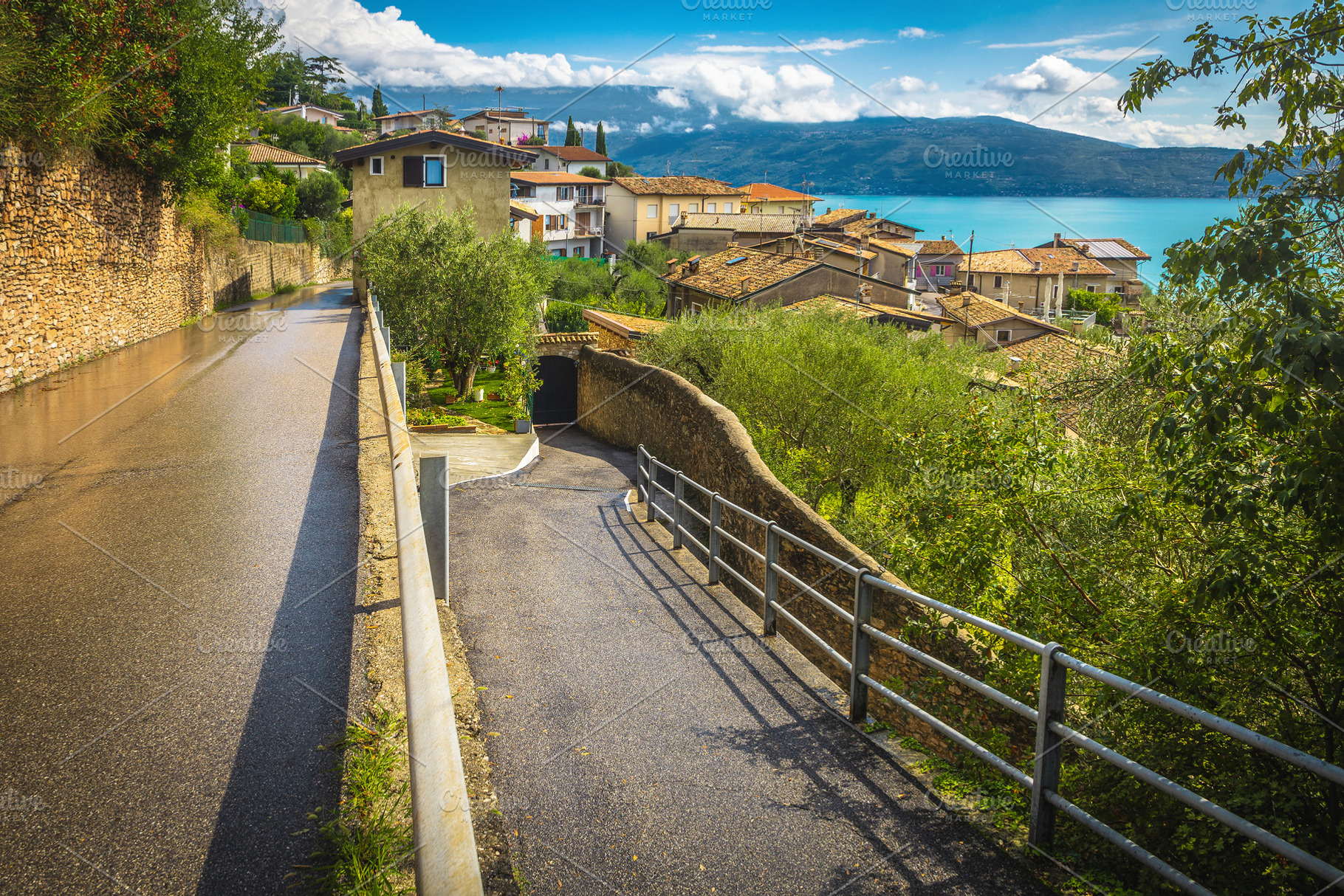 Lake Garda view from the pathway, an Architecture Photo by Alpine Dreams