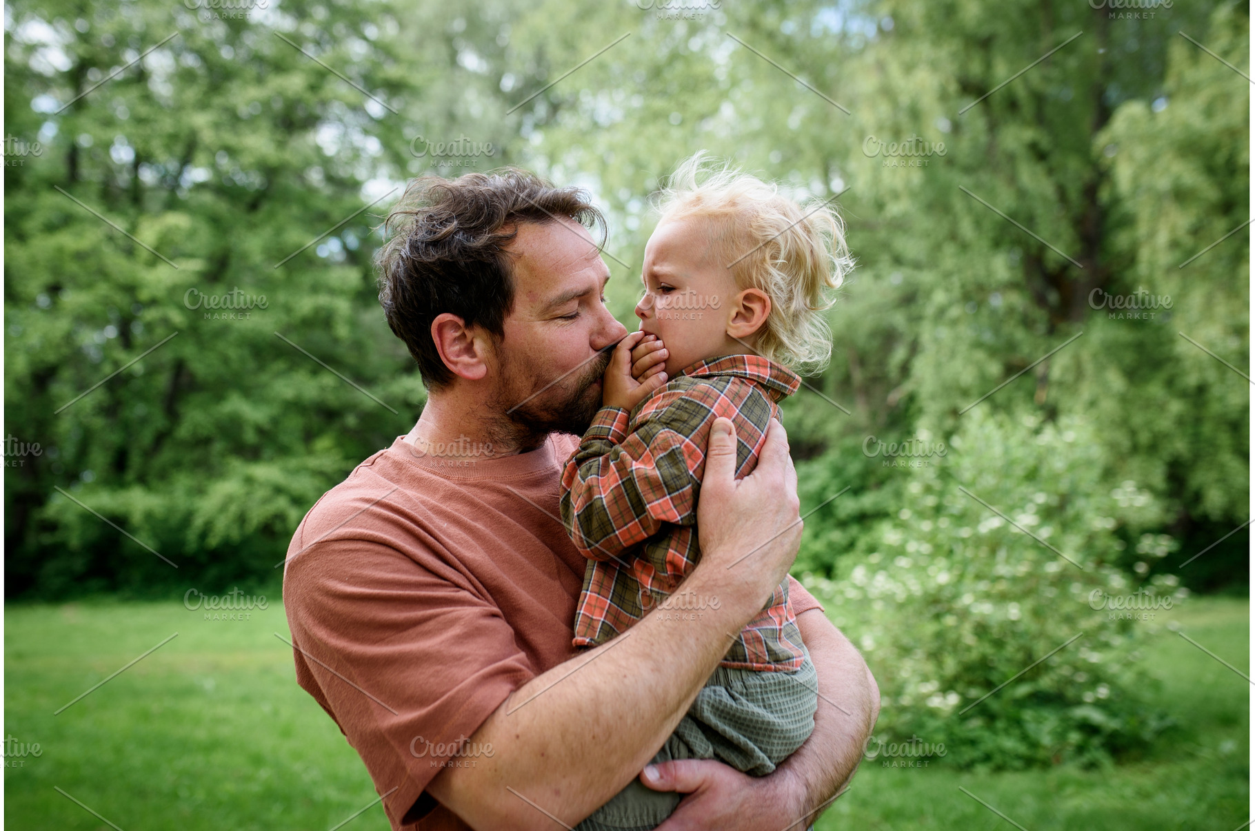 Loving father helping to injured, a Health & Medical Photo by HalfPoint