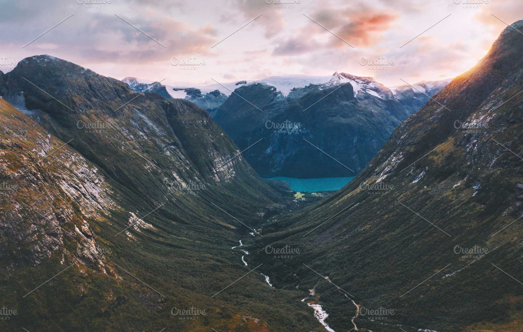Aerial view mountains valley and lov containing norway, lake, and landscape, a Person Photo by e v e r s t