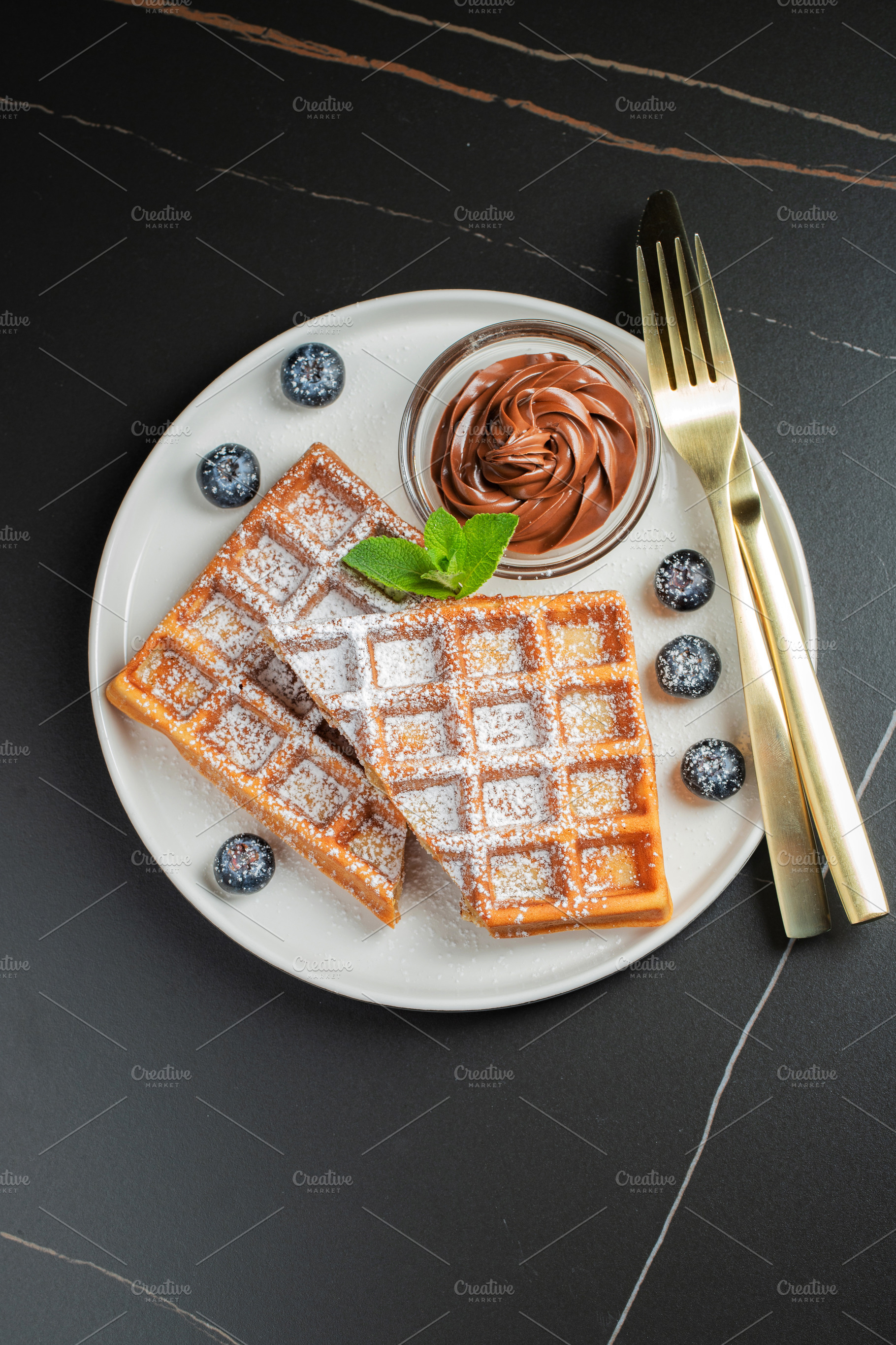 Belgium waffles Homemade waffles with strawberries, a Food & Drink Photo by Budarinphoto