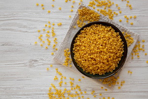 Homemade Perlini Pasta in a Bowl, top view. Copy space., a Food & Drink Photo by LiudmylaChuhunova