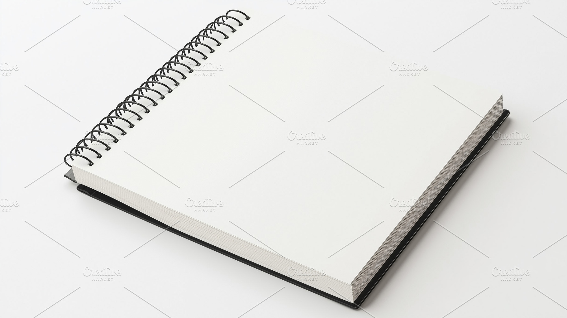 Blank notebook with spiral binding, a Background Photo by MistyDay