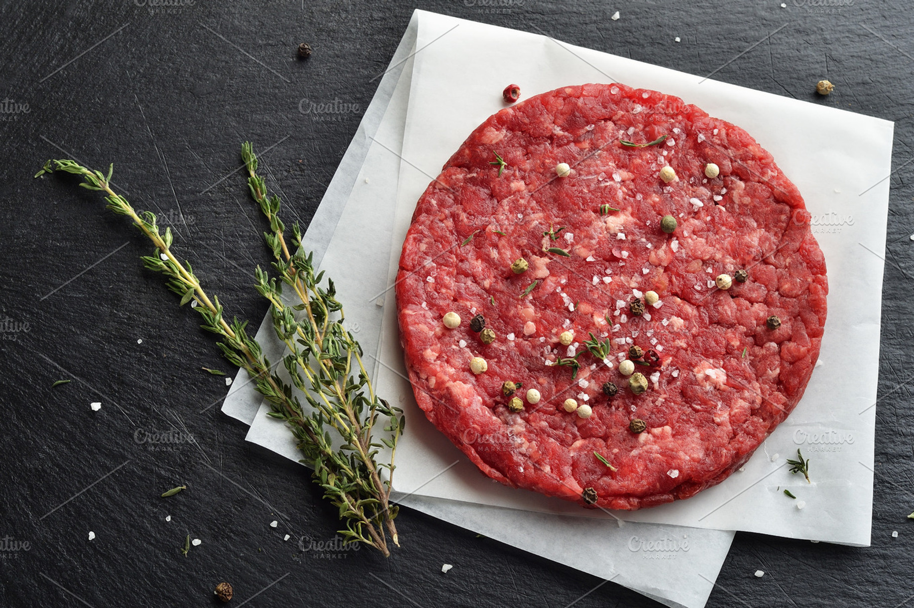 Fresh raw beef burger patty featuring beef, prime, and black angus, a Food & Drink Photo by Food Stock