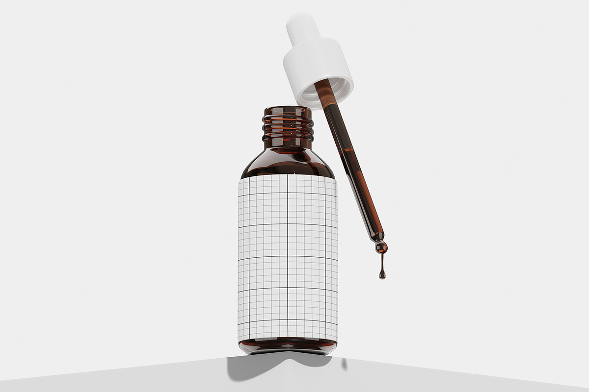 Glass Dropper Bottle Mockup, a Packaging Mockup by Unerispace (Photo 3 of 4)