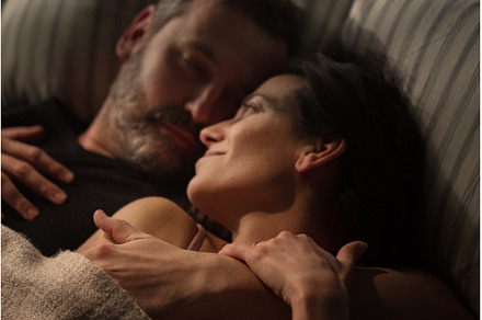 Close-up of mid-adult couple lying, a Person Photo by HalfPoint