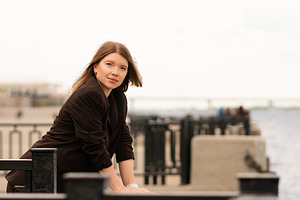 Smiling woman in brown blazer, a Person Photo by Elena Vagengeim