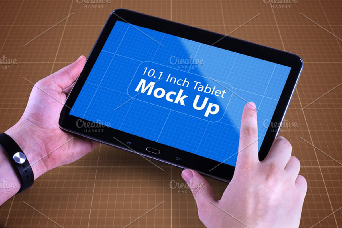 Tablet in Hand Mock Up, an iPad Mockup by Qaleb Studio (Photo 4 of 11)
