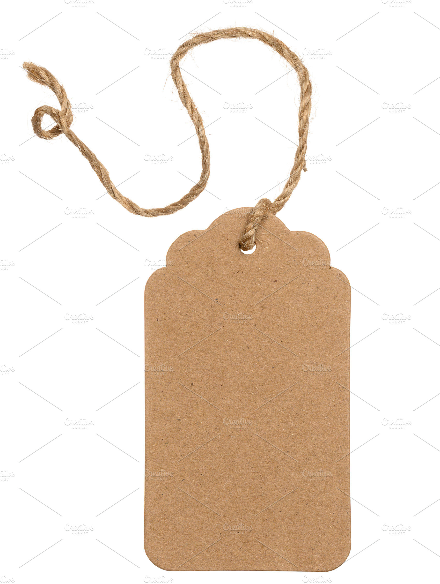 A blank kraft paper tag with rounded and shaped edges, suspended, a Business Photo by ndanko