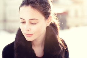 Pretty girl in a fur coat containing girl, female, and young