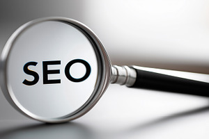 Magnifying glass focusing on the SEO, a Technology Photo by MistyDay