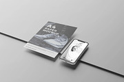 Phone & A4 Paper Mockup, an Advertising Mockup by Se٧enStudio (Thumbnail 1 of 3)