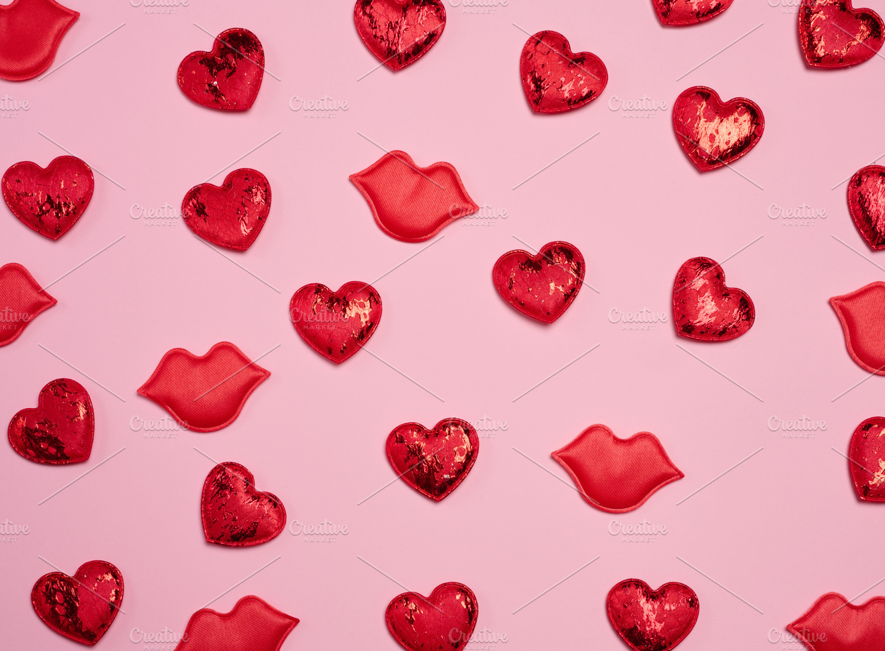 Pattern of red glitter hearts and lip appliqués randomly placed, a Holiday Photo by ndanko