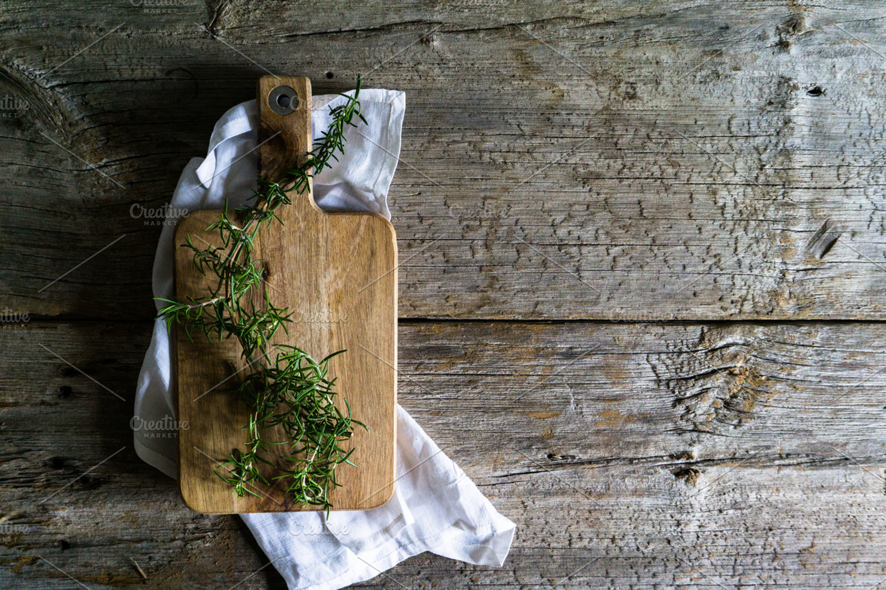 Rosemary on Cutting Board, a Photo by Britt Leah