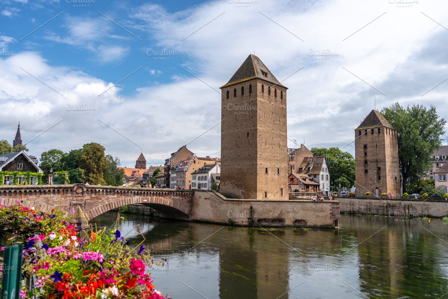 Covered Bridges towers and Ill river in Strasbourg France, an Architecture Photo by GoodGoods