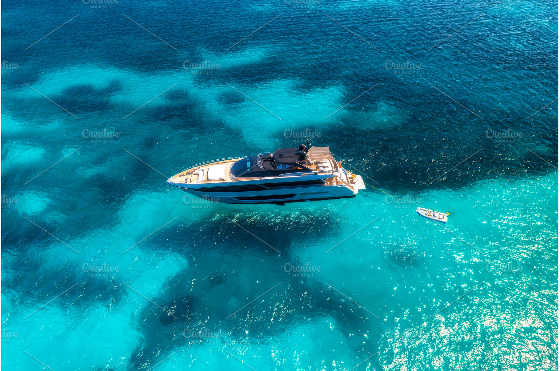 Aerial view of luxury yacht and boat, a Nature Photo by den-belitsky