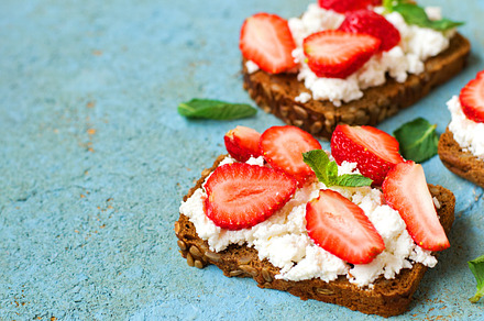 Sandwich with strawberries containing food, sandwich, and cottage cheese