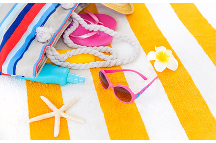 Beach towel with relaxation, a Holiday Photo by yanadjana