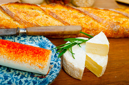 French cheese and fresh  baguette on a wood cutter, a Food & Drink Photo by keko64