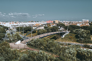Urban bridge in sunny Spanish town, an Architecture Photo by SkyNext