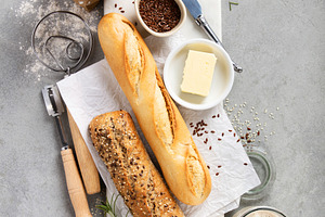 Baking Ingredients and Fresh Baguettes on Light Stone Surface, a Food & Drink Photo by Natalia Klenova's Shop