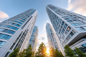Modern skyscrapers rise against a bright sunset in an urban landscape with vibr, an Architecture Photo by AlyaAnd