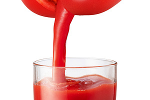 Glass tomato juice and fresh juice pouring from tomato fruit int, a Food & Drink Photo by Volff
